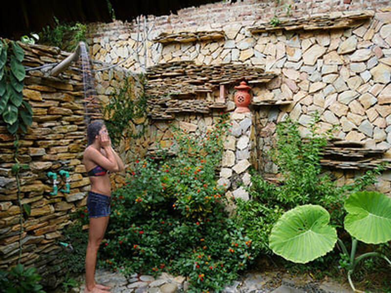 Mai Chau optional extension - Step out the back door to your secluded private patio and refresh yourself under the outdoor shower. Stay in your bathing suit or strip down to your birthday suit … no one can see you! (There’s also a luscious indoor shower and tub on the off-chance that the day is chilly.) 